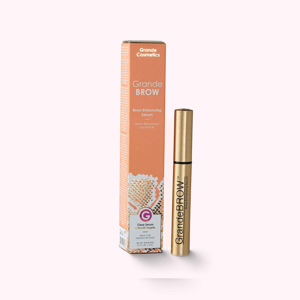 Orange box next to golden tube with GRANDE COSMETICS BROW ENHANCING SERUM infused with a blend of vitamins, antioxidants, and amino acids. No parabens. No artificial color or fragrance. 0.1 fl oz / 3 ml